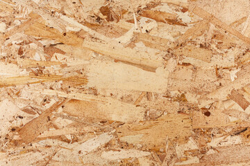 Wood texture. Osb wood board for background decoration. OSB board texture. Brown wooden background.