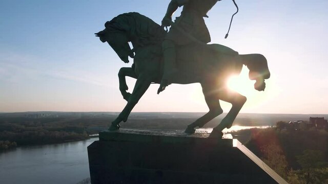 Monument to Salavat Yulaev in Ufa. Rider hero. National hero. Monument at the top of the mountain. Monument in the rays of the setting sun. Beautiful sunset in the park. The beauty of Russia.