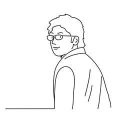 Young man in glasses turning around and smiling.