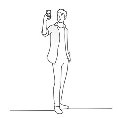 Guy taking selfie for social media on mobile phones