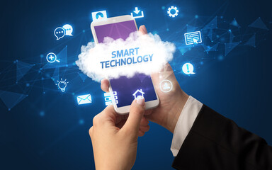 Hand using smartphone with cloud technology concept