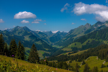 Fototapeta premium Landscape view of the Swiss Alpes from the Kaiseregg and Luchere Mountains, Shot in Jaun area, Fribourg, Switzerland