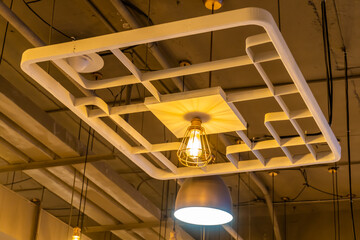 Antique lamps decorate the interior of the building, giving off a warm yellow glow.