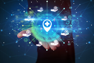 Fototapeta premium Hand holding healthcare icons concept