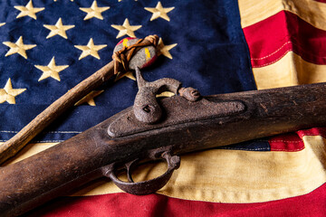 musket gun on American flag