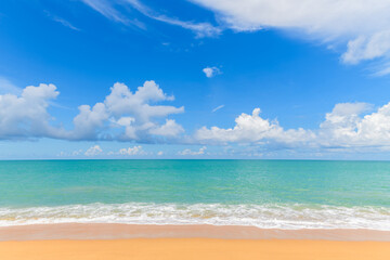 Fototapeta na wymiar Beautiful beach and sea with Blue Sky Background at Mai Khao Beach Phuket,