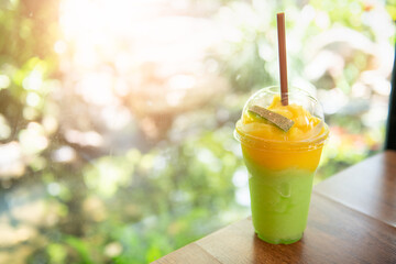 Melon and mango Smoothie on table,