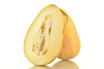 Two half organic ripe yellow melon, close-up, isolated on white.