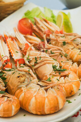 Delicious Croatia seafood platter - grilled langoustine shrimps from fresh catch of the day
