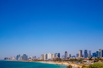 Fototapeta premium Tel Aviv, Israel - June 27, 2021: Tel Aviv view from Jaffa on a sunny day
