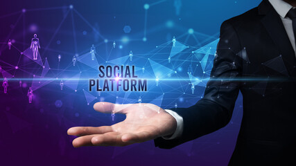 Hand holding social media related inscription