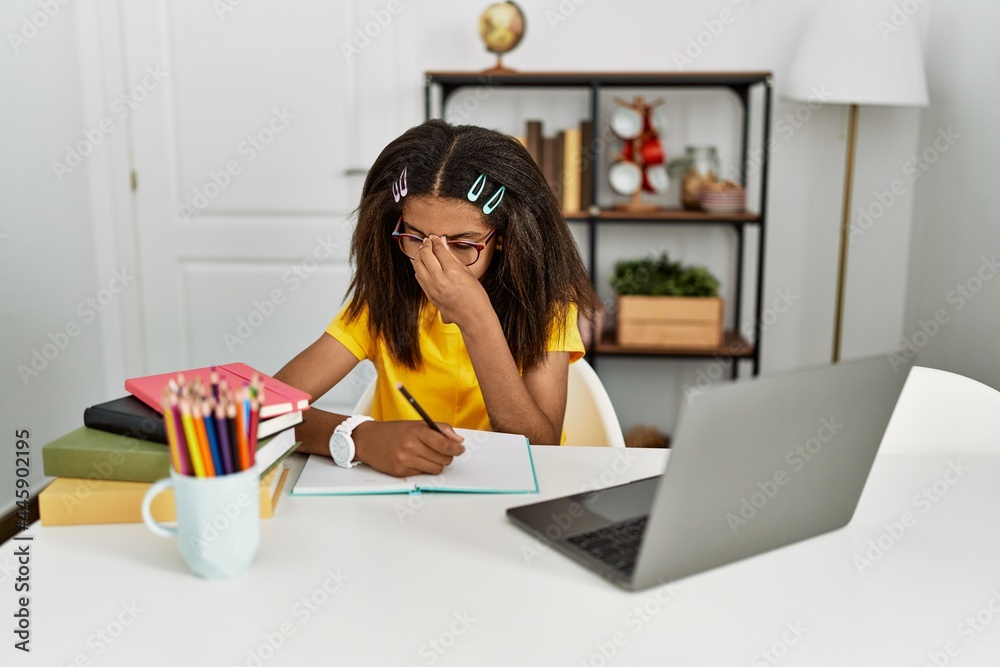 Sticker young african american girl doing homework at home tired rubbing nose and eyes feeling fatigue and h