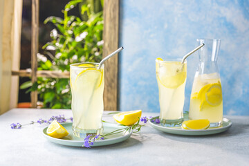 Glasses of lavender lemonade with cube ice with lavender flowers