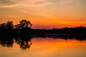Orange sunset over the lake