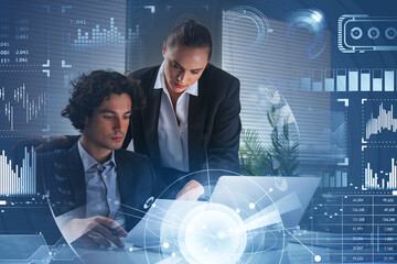 Businessman and businesswoman looking into business report. Holo