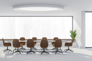 Modern meeting room with brown office chairs in panoramic white space