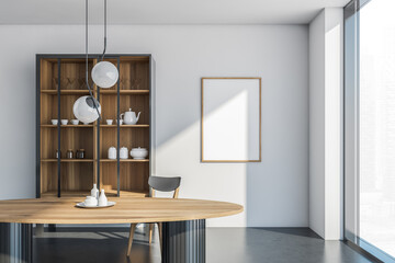 Banner in the light dining space with panoramic window and cupboard