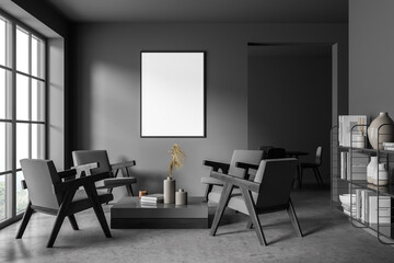 Mock up empty poster on the wall. Modern living room interior. Stone floor and stylish furniture. Concept of contemporary design.