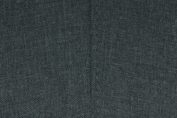 Fototapeta na wymiar Close up of rough gray textured fabric
