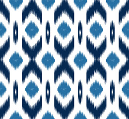 Abstract . Ikat seamless pattern traditional. line indigo on white background. design for pillow, print, fashion, clothing, fabric, gift wrap.  Vector.