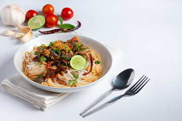Rice noodles in fish curry sauce with vegetables