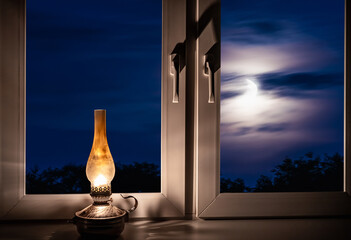 night landscape outside the window moon old lamp windowsill