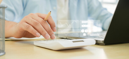 close up businessman press calculator  to working about summary on forecasting financial exchange market with dashboard tools monitor for futuristic technology concept	