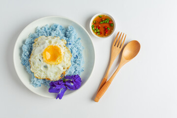 delicious breakfast scrambled eggs in white plate and clean white background