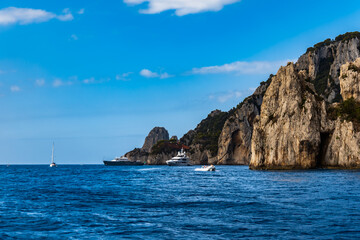Fototapeta na wymiar Edge of high cliff next to the sea at sunny day on Capri island