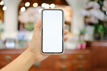 Women's hands holding cell telephone blank copy space screen. smartphone with blank white screen isolated on white background . smart phone with technology concept