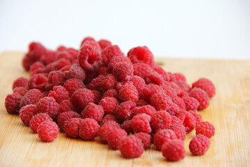 raspberries on a wooden background