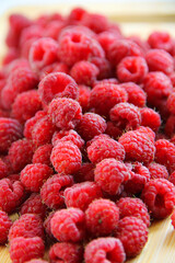 fresh raspberries on a white background close-up