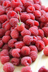 fresh raspberries on a white background close-up
