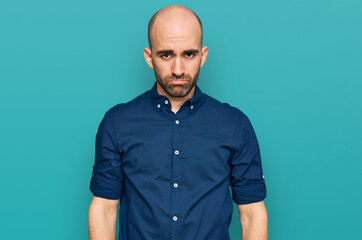 Young hispanic man wearing casual clothes depressed and worry for distress, crying angry and afraid. sad expression.