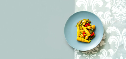 Diet salad of mushrooms and vegetables on gray background. Vegetarian food concept. Creative layout. .