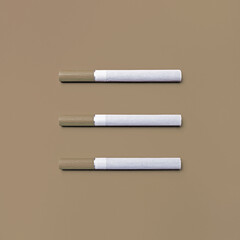 Photo of three cigarettes. Top view. Flat lay.