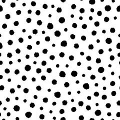 Black different round small ink dots isolated on white background. Cute monochrome geometric seamless pattern. Vector simple flat graphic hand drawn illustration. Texture.