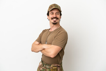 Soldier man isolated on white background with arms crossed and happy