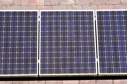 Solar Panels On The Roof Of A Residential Building. No People.