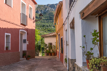 Fototapeta na wymiar Nice street of a Spanish Mediterranean town adorned with plants