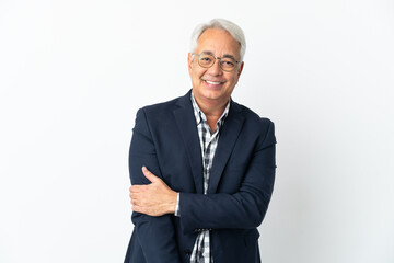 Middle age Brazilian man isolated on white background laughing