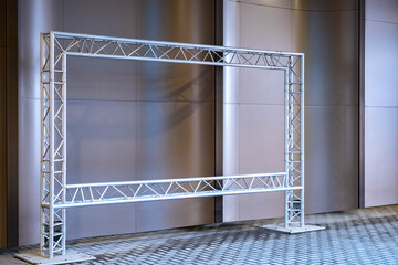 White truss construction. truss structure for banner or screen. Empty truss construction. Metal frame for advertising banner. Banner metal frame. Wireframe for some kind of advertisement.