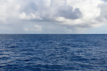 Naklejka na ściany i meble Seascape, blue sea. Calm weather. View from vessel.