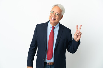 Middle age Brazilian business man isolated on white background smiling and showing victory sign