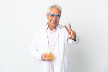 Middle age Brazilian scientific man scientific isolated on white background smiling and showing victory sign