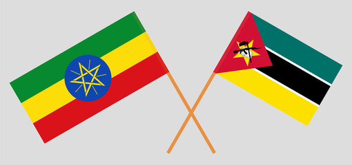 Crossed flags of Ethiopia and Mozambique. Official colors. Correct proportion