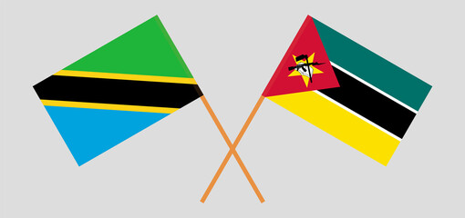 Crossed flags of Tanzania and Mozambique. Official colors. Correct proportion