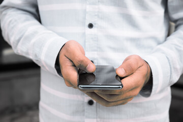 man holding smart phone