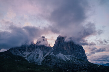 Sunset view os Sella pass (Passo Sella), Sassolungo and people enjoying sunset.