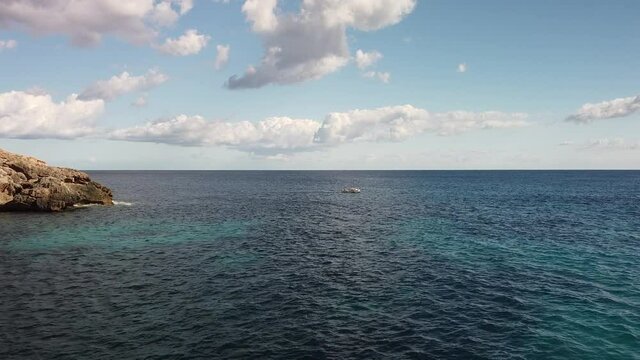 aerial Seascape in the mediterranean sea with boat sailing